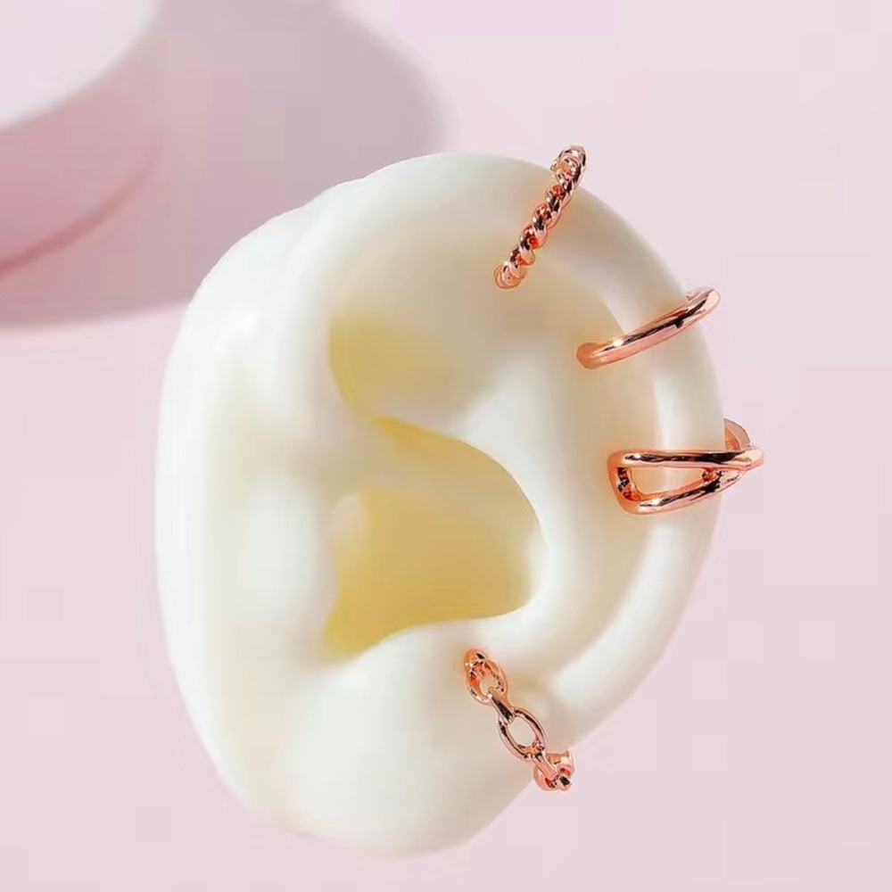 NWT rose gold ear cuffs